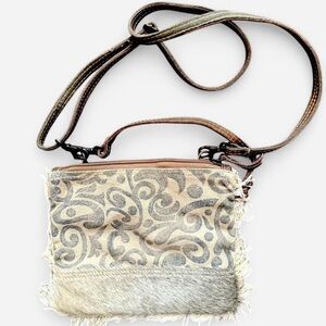 MYRA BAG Tan and brown western crossbody bag with fringe and faux fur.
